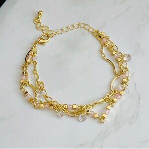 18k gold plated CZ pink quartz 3 row 7" to
9" bracelet